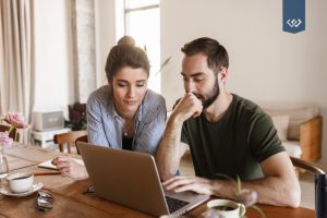 home-buying-process-couple-laptop